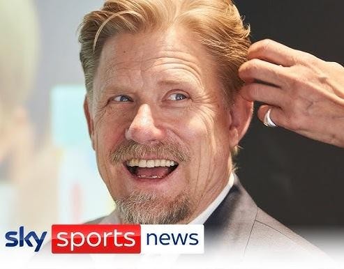 Peter Schmeichel wykonujący spektakularną paradę w barwach Manchesteru United.
