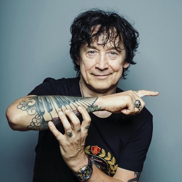Jan Borysewicz podczas energetycznego solo na gitarze podczas koncertu Lady Pank.